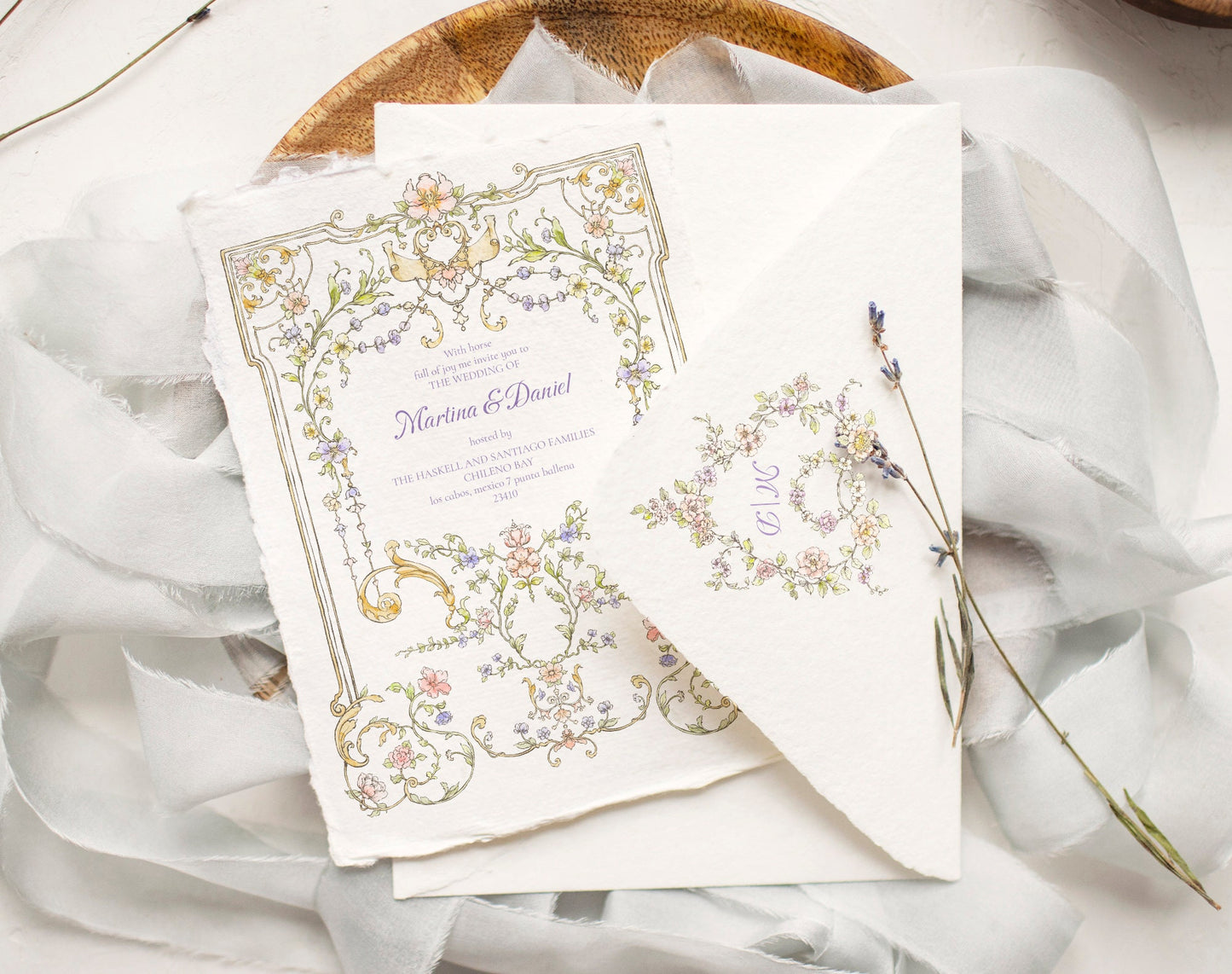 Invitation card and envelope showing Floral Grace border and garland corner