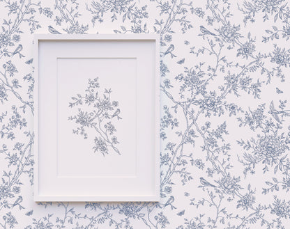 White frame with bird and flower on a  Toile de Jouy Floral Poetry pattern wallpaper background
