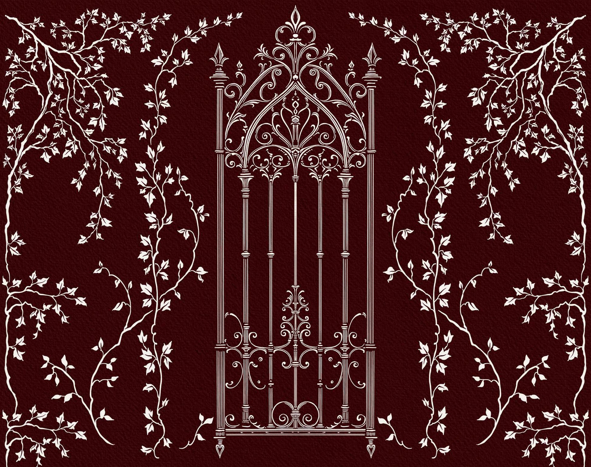 Decorative wrought-iron Gothic gate framed by curling vines and leaves.
